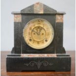 An Edwardian mantle clock in slate and marble, with Arabic dial.