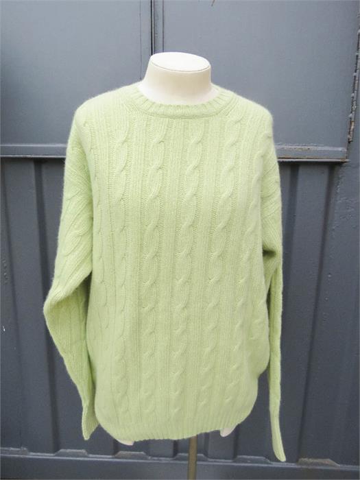 A green Lord jumper, size 44, with 75% merino wool.