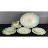 A Susie Cooper 1930s part dinner service in the Dresden Spray pattern, comprising meat plate,