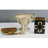 A brass candle snuffer, a leather box and a leather cased sewing kit, and a silver plated bon bon