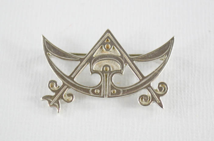 A vintage Ola Gorie sterling silver 'Masonic' crescent brooch.