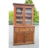 A Victorian mahogany secretaire bookcase, the glazed top enclosing three interior shelves, above the