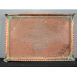 An Arts & Crafts copper tray with hammered and shaped sides.