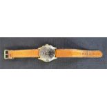 A 18ct gold cased wristwatch, with leather strap. A/F