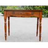 A 19th century two drawer side table, with turned legs.