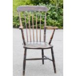 A 19th century country kitchen armchair.