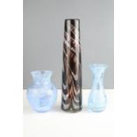 Two Caithness bud vases, and a glass stem vase, with swirl pattern.