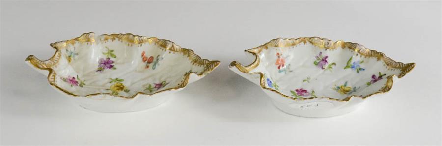 A pair of porcelain leaf form dishes, Dresden style. 12cm long.