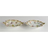 A pair of porcelain leaf form dishes, Dresden style. 12cm long.