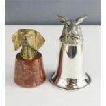 A steel stirrup cup with hare form top, and a brass paperweight in the form of a hound head.
