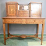A 19th century French marquetry rosewood Bonheur de Jour, with raised back composed of cupboards and
