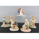 A group of Goebel figures to include Special Delivery, Spring Blossoms, Tender Loving Care and The