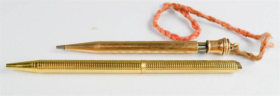 A rolled gold propelling pencil, and a pen.