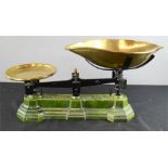 A set of brass and cast iron scales.