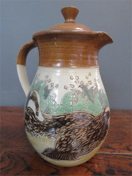 M&J Mosse of Llanbrynnair (20th century, Welsh) pottery jug impressed with badgers.