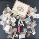 A quantity of various coins including GB examples, together with three penknives.