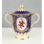 A Royal Crown Derby limited edition no. 17 of 200 urn and cover, initalled in gold JMC, to the