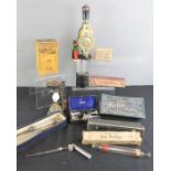 A group of vintage medical implements including a Victorian Whooping cough vaporiser in original