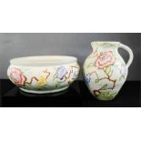 A 1930s H.J. Wood hand painted jug and bowl in the Chinese Rose design. 22cm tall and 25cm