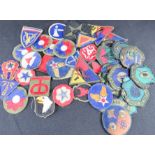 A selection of WWII and later US Army and Airforce cloth badges.