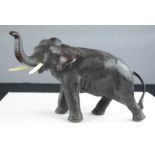 A bronze elephant, circa 1900. 18cm high.