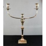 A silver plated candleabra, with three branches. 53cm high.