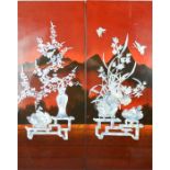 A pair of Japanese panels red lacquered and inlaid with mother of pearl.