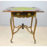 An Edwardian envelope card table with swivel top, counter dishes, and baise lining.