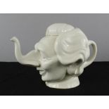 A Luck & Flaw teapot circa 1980 in the form of Margaret Thatcher with elephant form trunk spout.