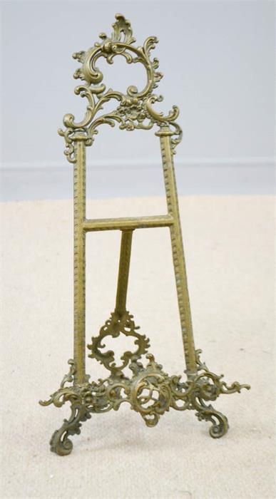 A brass cast picture stand.