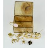 A mother of pearl trinket box, containing jewellery, including necklaces, brooch etc.