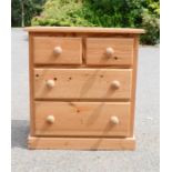 A small pine chest of drawers