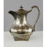 A silver tea pot, Sheffield 1936, 21.29toz.