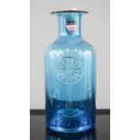 A blue Dartington glass caraf.