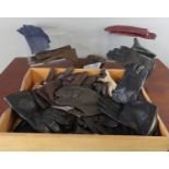 A quantity of leather gloves, some vintage.