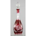 An early 20th century Bohemian cranberry cut glass lead crystal decanter and stopper.