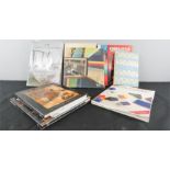 A group of reference books on quilting, including The Country Quilters Companion.