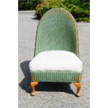 A Lloyd loom chair with sprung seat.