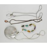 A group of jewellery, including a mother of pearl shell necklace, semi precious stone bracelet etc.