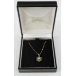 A 9ct gold flowerhead pendant necklace.