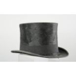 A ladies top hat made by Dunn & Co London.