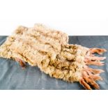 A mink scarf with tail tassels.