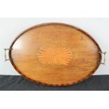 A 19th century oval tray with inlaid central motif.