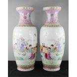 A pair of 20th century Chinese vases, depicting figural scenes to the body, 64cm high.