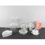 A group of crystal and glass containing swans, candleholders, etc.