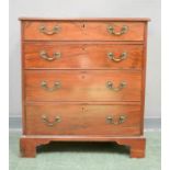 A Georgian flame mahogany chest of drawers, four graduated drawers with rococco scroll form