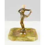 An Art Deco style agate dish with dancing lady to the centre.