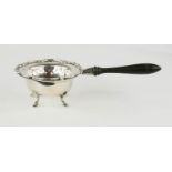 A silver strainer and stand, Sheffield, 2.76toz.