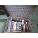 A trunk containing WW2 magazines.