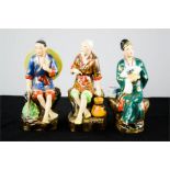 Three early 20th century Chinese seated figures.